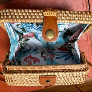 Stylish Rectangular Tan Woven Crossbody Bag 6x7.5x3” w/ 24” drop strap.